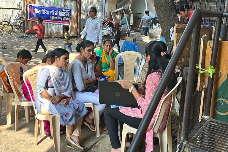 Project DIA: disability identification and awareness camp, staff registering community members